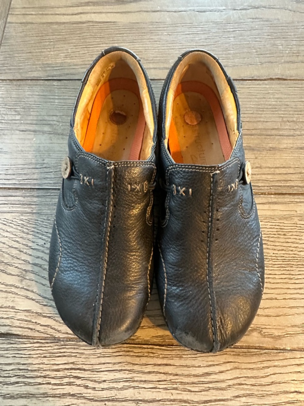 Women's Black Leather Slip-On Mules with Button Detail